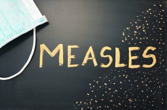 measles written on blackboard