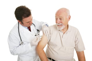 senior man getting flu shot - shutterstock_9662044